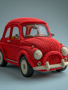 精巧可爱的红色毛线小车背景图片