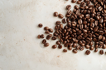 散落开的咖啡豆背景图片