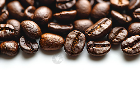 桌面上鲜美的咖啡豆背景图片