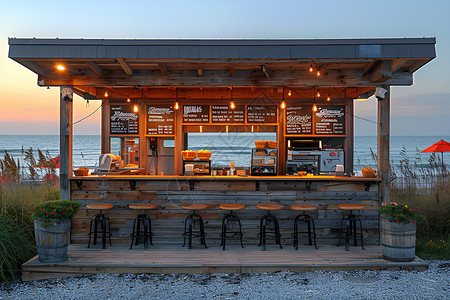 海滩边的小吃亭背景图片