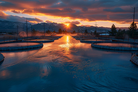 日落下的污水处理厂背景图片