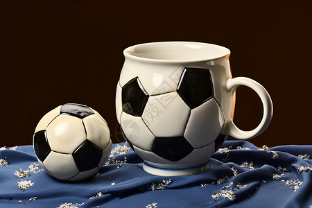 黑布料素材足球和杯子背景