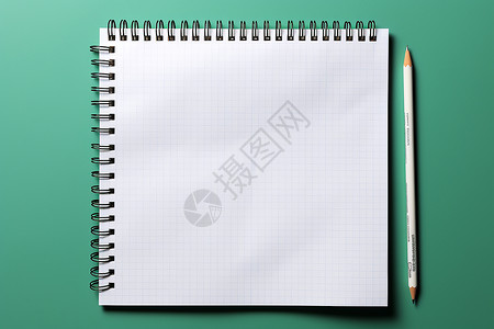 空白笔记本和笔背景图片