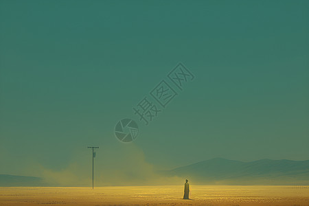 沙丘上孤独行走的人高清图片