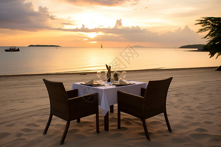 浪漫餐桌海滩上浪漫的晚餐背景
