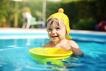 游泳的婴儿游泳池内的可爱男孩背景