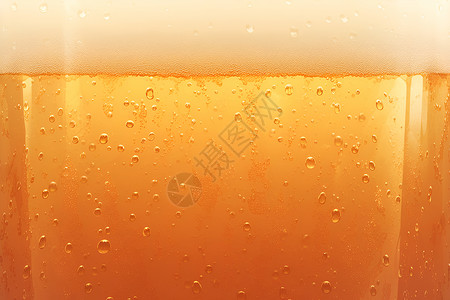 啤酒杯上的气泡背景图片