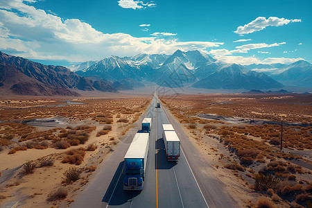 行驶的卡车货车队沿着山路行驶设计图片