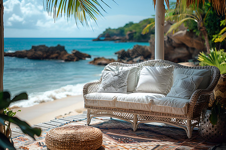 沙滩上的藤编沙发背景图片