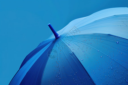 提手蓝色雨伞背景