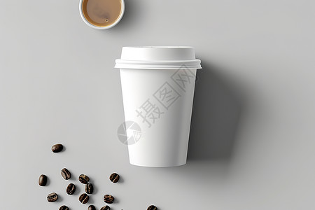 杯子旁的咖啡豆背景图片