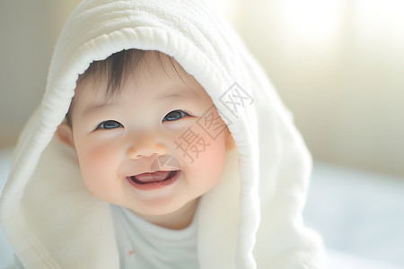 儿童 笑宝宝在床上开心地笑着背景