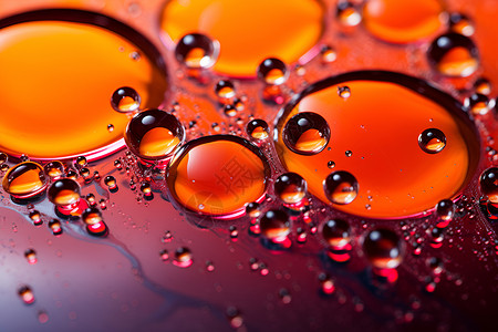 油泡泡水滴在橙色表面背景