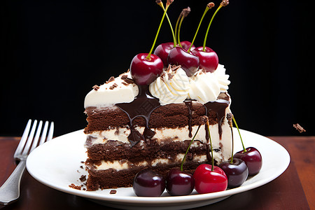 一整块巧克力奶油蛋糕上的樱桃背景