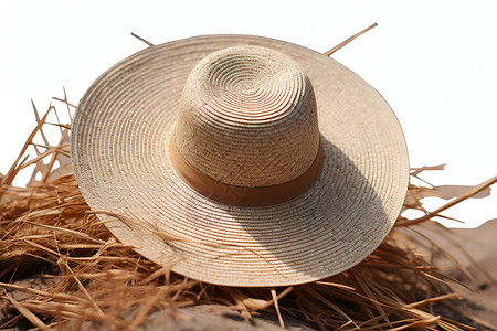 夏日沙滩上的稻草帽背景