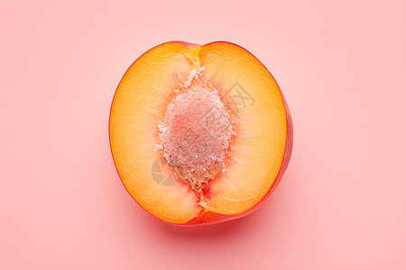 美味的桃子粉色背景上切开的桃子设计图片