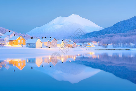 雪山山脉下的住宅房屋图片